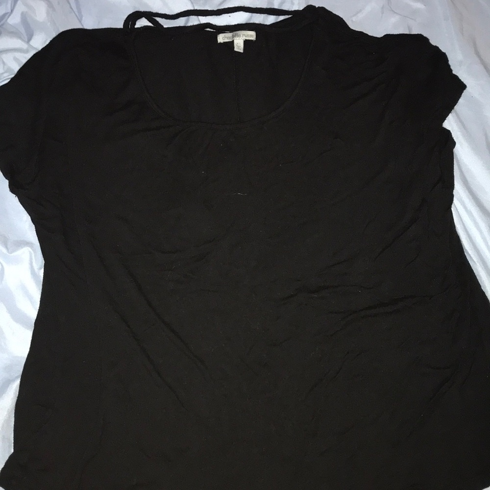 A black shirt wit a 2 collar strips